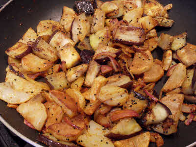 Add baingan, potatoes, salt and mix thoroughly