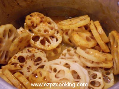 Cook lotus roots till soft