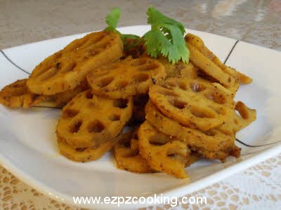 Mix amchur powder and garnish with coriander leaves