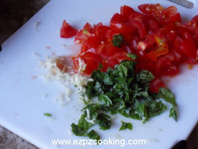 Chop tomatoes, basil leaves and garlic