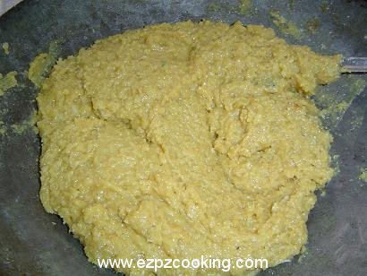 Coconut burfi mixture will become thick