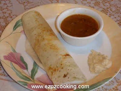 Serve dosa with sambhar and coconut chutney