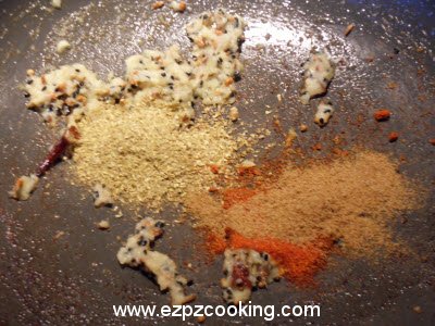 Add chilli powder, coriander powder, cumin powder to the egg curry