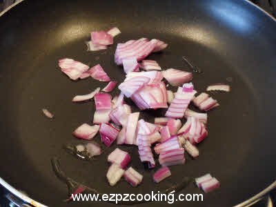 Fry chopped onion for Fried Baingan