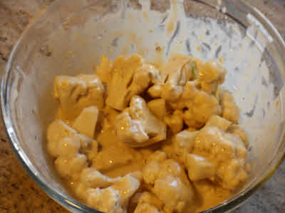 Mix gobhi pieces in the batter