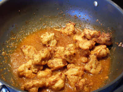 Add fried gabhi to the gravy and mix well