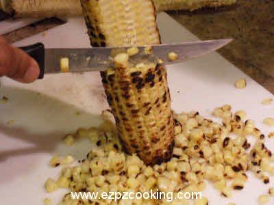 Remove the kernels from the corn cobs