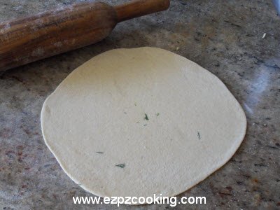 Roll the dough for stuffed mooli parantha