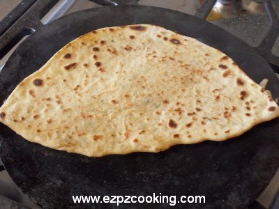 Cook stuffed mooli parantha