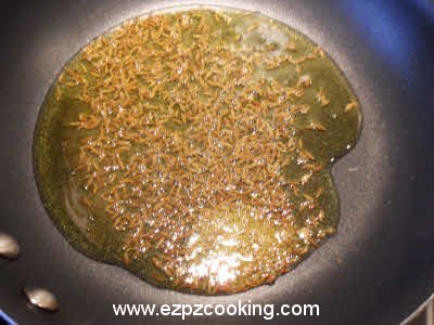 Add cumin seeds to the ghee