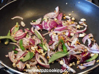 Fry onions for upma