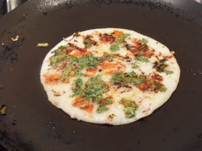 Cook uttapam from both sides