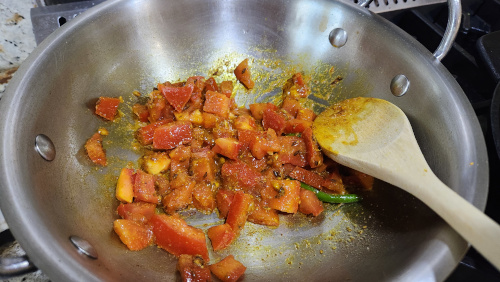 Cook tomatoes