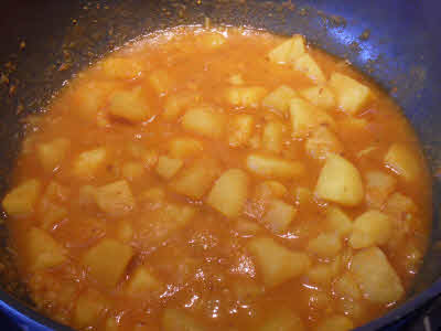 Cook potatoes in gravy