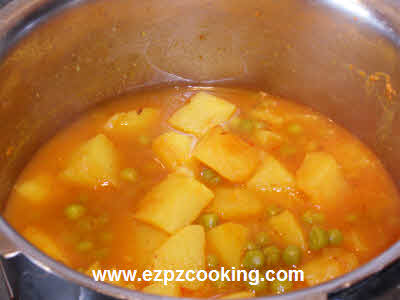 Aloo Matar Curry is cooked