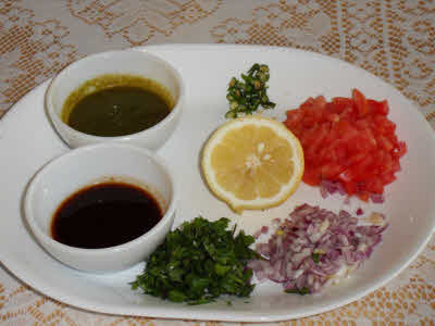 Chop onions, tomatoes, coriander leaves, green chillies