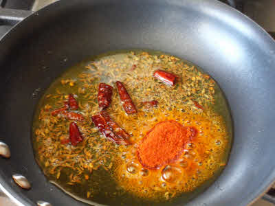 Preparing chaunk for masoor dal