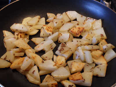 Add potato pieces and stir fry