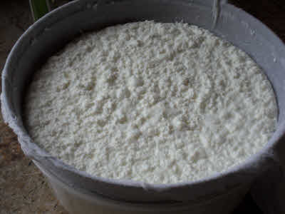 Sieve curdle milk in muslin