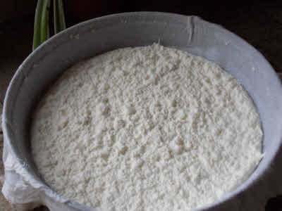 Sieve curdle milk in muslin