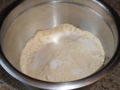 Add salt to wheat flour and mix for the dough