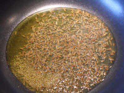 Crackle cumin seeds for urad dal tadka