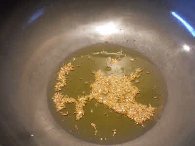 Prepare tempering for Whole Moong Dal