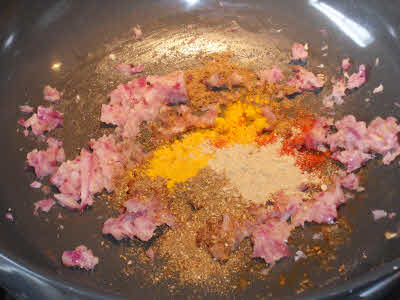 Add spices to the chole gravy