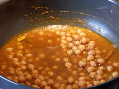 Add boiled chole to tomato mixture