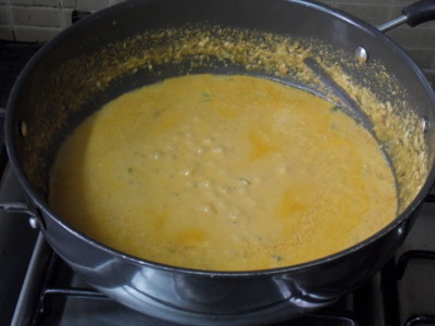 Add haldi, red chilli powder and kari leaves
