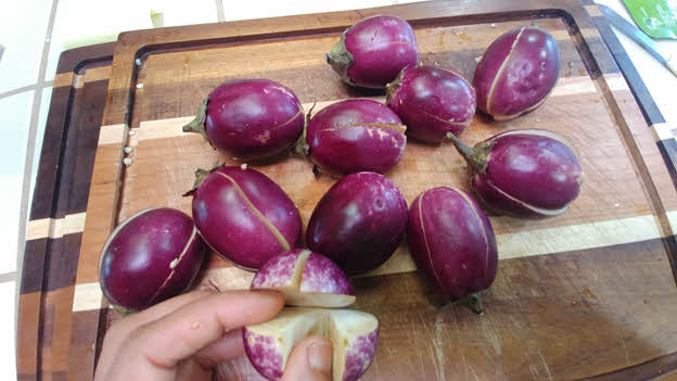 Slit the eggplants
