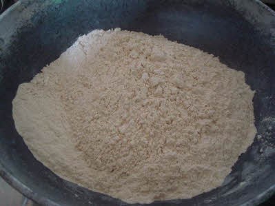 Add wheat flour when ghee melts
