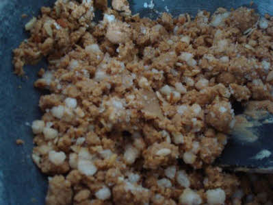 Add puffed gond to the laddoo mixture