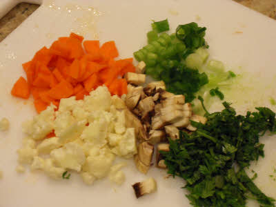 Chop vegetables for Hot And Sour Soup