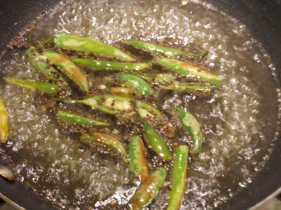 Add lime juice and water to Dhokla tempering