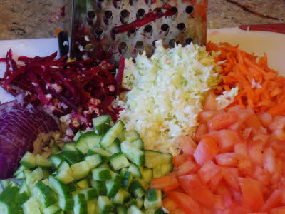 Chop vegetables for kachumar salad