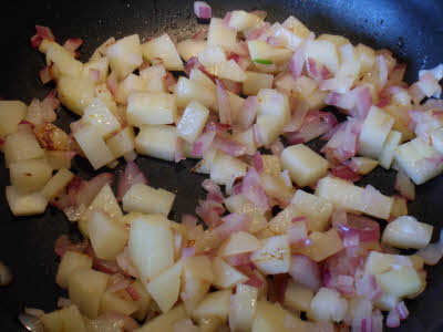 Saute onions and potatoes for sabudana khichdi