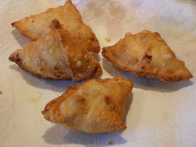 Drain samosa on paper towel