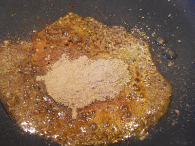 Add spices to the oil
