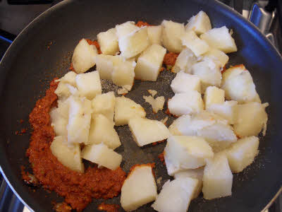 Add cut potatoes