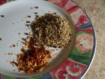 Coarsely grind all the spices