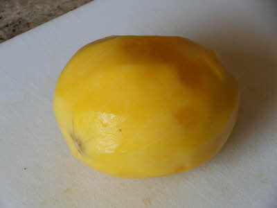 Peel the mango