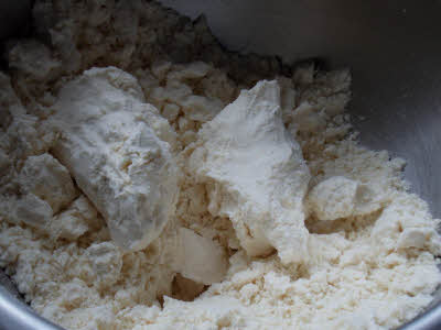 Adding ghee to the flour