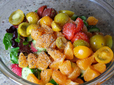 Add salt and pepper to mandarin salad