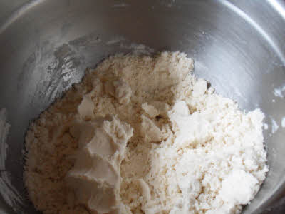 Rub oil in flour