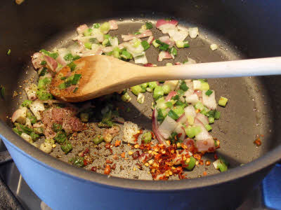 Add spices for vegetable risotto