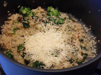 Add cheese to vegetable risotto