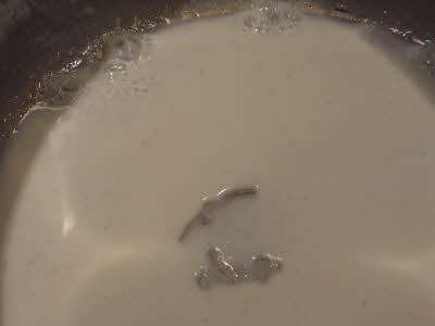 Add milk for Creamy Tomato Soup