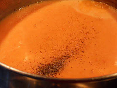 Add tomato puree for Creamy Tomato Soup