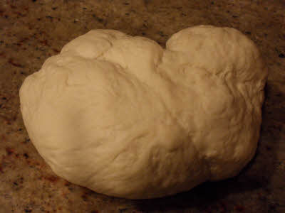Punch down the dough for amritsari kulcha dough